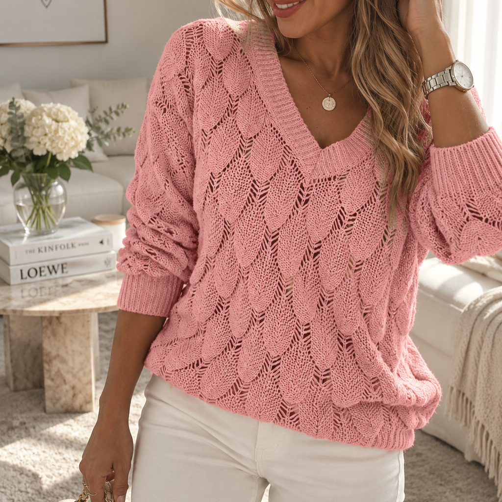 Pull femme rose en maille ajourée à col V